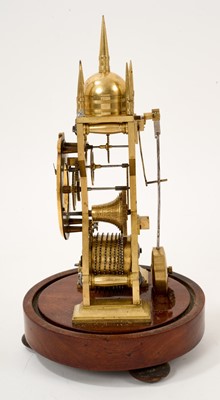 Lot 625 - Victorian brass skeleton clock, the dial inscribed Cockburn, Richmond, 168, with single fusée movement, under glazed dome (damaged)