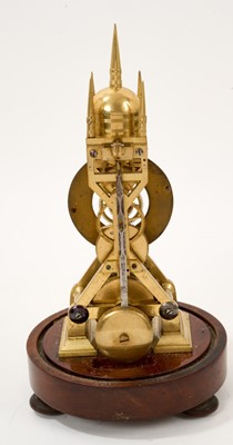 Lot 625 - Victorian brass skeleton clock, the dial inscribed Cockburn, Richmond, 168, with single fusée movement, under glazed dome (damaged)