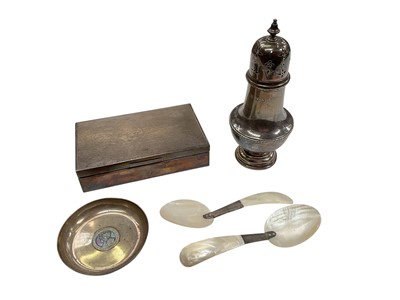 Lot 1053 - Silver cigarette box, silver castor, silver coin pin dish and a pair of mother of pearl caviar spoons