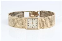 Lot 3299 - Ladies' gold (9ct) Omega wristWatches on gold...