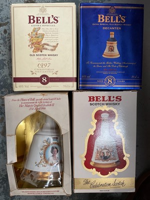 Lot 49 - Four bottles of Bell's whisky in commemorative decanters