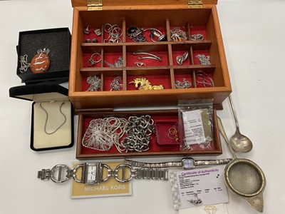 Lot 1034 - Wooden jewellery box containing silver mounted amber and amethyst jewellery, silver chains, other costume jewellery, bijouterie and a Michael Kors wristwatch with booklet