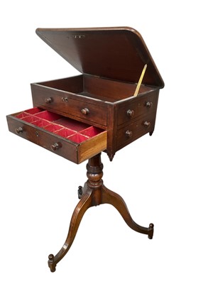 Lot 5232 - Regency mahogany sewing table on tripod base (top warped)
