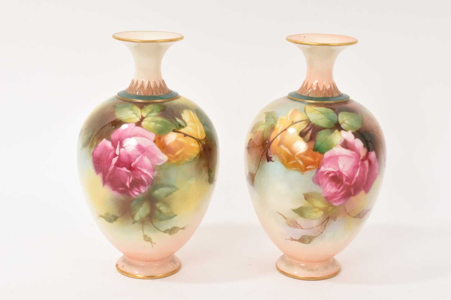 Lot 13 - Pair of Royal Worcester vases hand painted with flowers, one signed H Martin