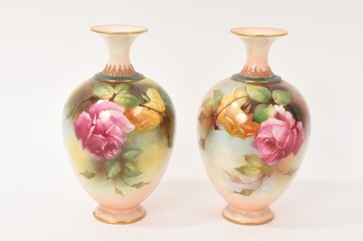 Lot 13 - Pair of Royal Worcester vases hand painted with flowers, one signed H Martin