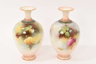 Lot 13 - Pair of Royal Worcester vases hand painted with flowers, one signed H Martin
