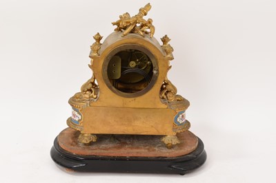 Lot 634 - 19th century French gilt brass mantel clock with inset porcelain panels
