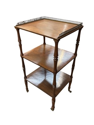 Lot 1218 - Regency style three tier mahogany whatnot