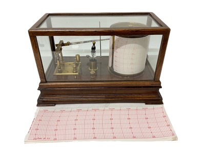 Lot 649 - Early 20th century barograph in glazed case, together with extra charts