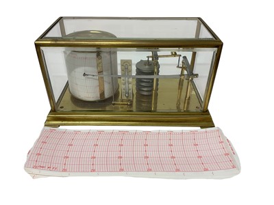 Lot 646 - Early 20th century barograph in glazed case, together with extra charts