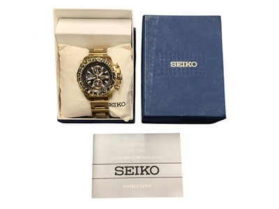 Lot 128 - Seiko chronograph gold plated stainless steel wristwatch with black dial and rotating bezel