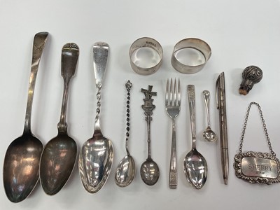 Lot 1006 - Group of silver and white metal flatware including a Georgian silver serving spoon, two silver napkin rings, silver 'Sherry' label and a Mappin & Webb silver pen