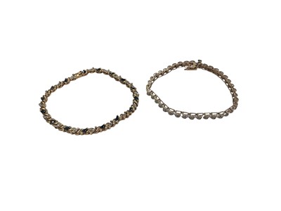 Lot 1013 - 9ct gold diamond tennis bracelet and 9ct gold marquise sapphire and diamond bracelet (2)