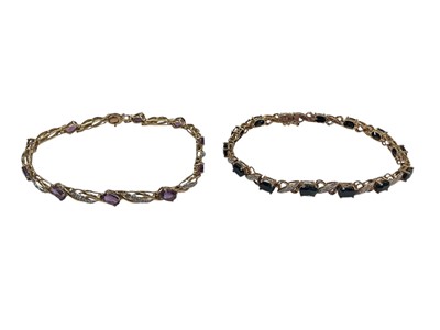 Lot 1014 - 9ct gold oval amethyst and diamond bracelet and 9ct gold oval sapphire and diamond bracelet (2)