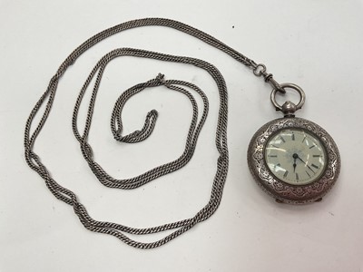 Lot 1017 - Silver fob watch with engraved floral decoration with a long white metal guard chain