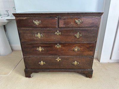 Lot 1272 - 18th century oak chest of two short and three long drawers with brass handles, on bracket feet, 94.5cm wide x 50.5cm deep x 86.5cm high
