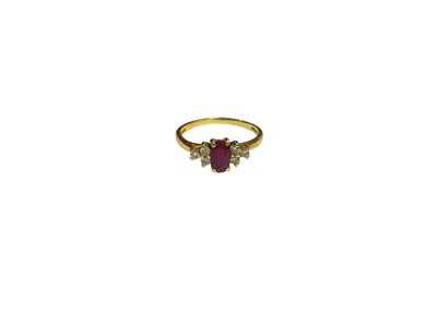 Lot 47 - 18ct gold ruby and diamond ring (London 1990)