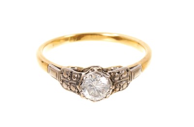 Lot 482 - Diamond single stone ring in platinum illusion setting on yellow gold shank