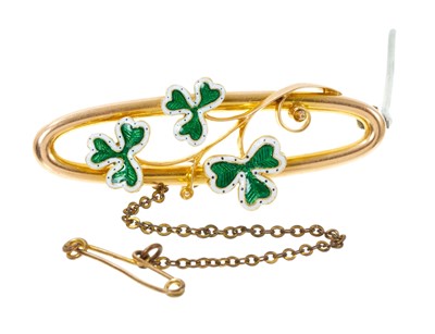 Lot 464 - Victorian 15ct gold and enamel brooch with three leaf clover open work design