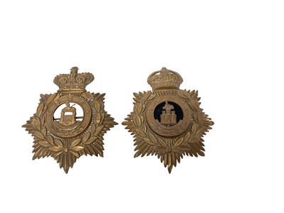 Lot 672 - Victorian other ranks blue cloth helmet plate, together with another Edwardian example (2).