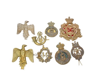 Lot 673 - Group of Victorian Essex Regiment military badges including Glengarry badges, helmet plate (possibly a reproduction), and others (8 badges).