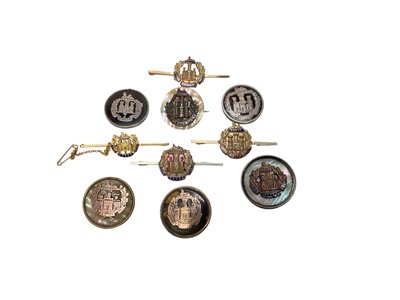 Lot 676 - Collection of four Essex Regiment Sweetheart brooches including a 9ct gold example and other silver Essex Regiment Sweetheart badges (10).