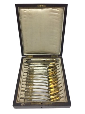 Lot 305 - Set of 12 early 19th century French silver gilt spoons and matching sugar tongs