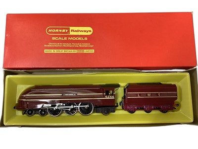 Lot 1965 - Hornby OO Gauge LMS maroon 4-6-2 Coronation Class King George VI tender locomotive, boxed R871 & loose LMS blue Coronation tender locomotive with three carriages & articulated car carrie...