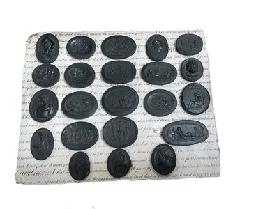 Lot 475 - Group of Grand Tour style intaglios, mounted on a sheet of vellum.