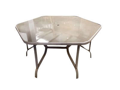 Lot 1337 - A metal and glass garden table