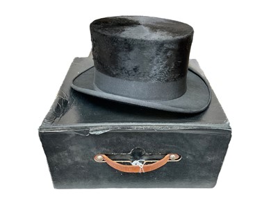 Lot 314 - Vintage black silk top hat by The Durable Hat expressly made for House of England, boxed