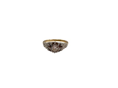 Lot 1092 - 18ct gold diamond single stone ring in platinum illusion setting with platinum shoulders on 18ct yellow gold shank