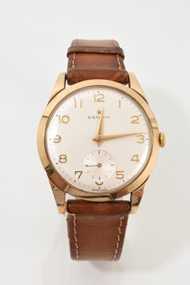 Lot 552 - 9ct gold manual wind Zenith wrist watch with a cream dial on a brown leather strap