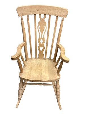 Lot 1334 - Pine rocking elbow chair