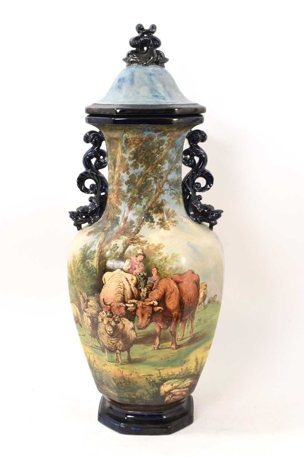 Lot 15 - Large 19th century continental majolica vase and cover, painted with pastoral scenes
