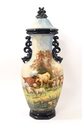Lot 15 - Large 19th century continental majolica vase and cover, painted with pastoral scenes