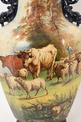 Lot 15 - Large 19th century continental majolica vase and cover, painted with pastoral scenes