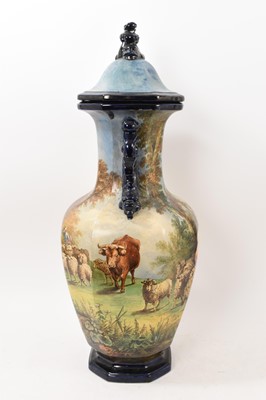 Lot 15 - Large 19th century continental majolica vase and cover, painted with pastoral scenes