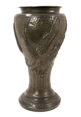 Lot 703 - Art Nouveau style French pewter vase decorated in relief with a stylised swan, on a hammered ground