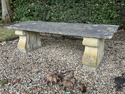 Lot 1277 - Garden seat with twin scroll end supports and slate seat, 122cm wide x 39cm deep