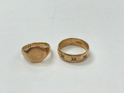 Lot 1041 - 9ct gold signet ring and 9ct gold diamond three stone gypsy set ring (2)