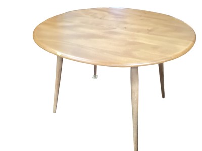 Lot 1267 - Ercol elm kitchen table and two chairs