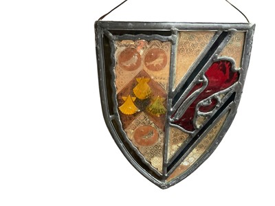 Lot 150 - Stained glass panel, of shield form, 25cm high