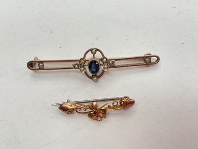 Lot 1059 - Edwardian gold sapphire and seed pearl bar brooch and another 9ct rose gold brooch (2)