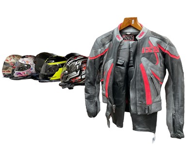 Lot 343 - Collection of motorbike helmets and a leather jacket and trouser set