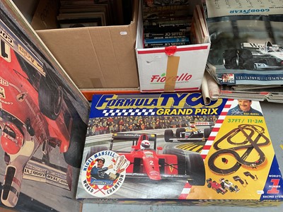 Lot 344 - Collection of Formula 1 pictures, posters, books and Formula Tyco Grand Prix, boxed