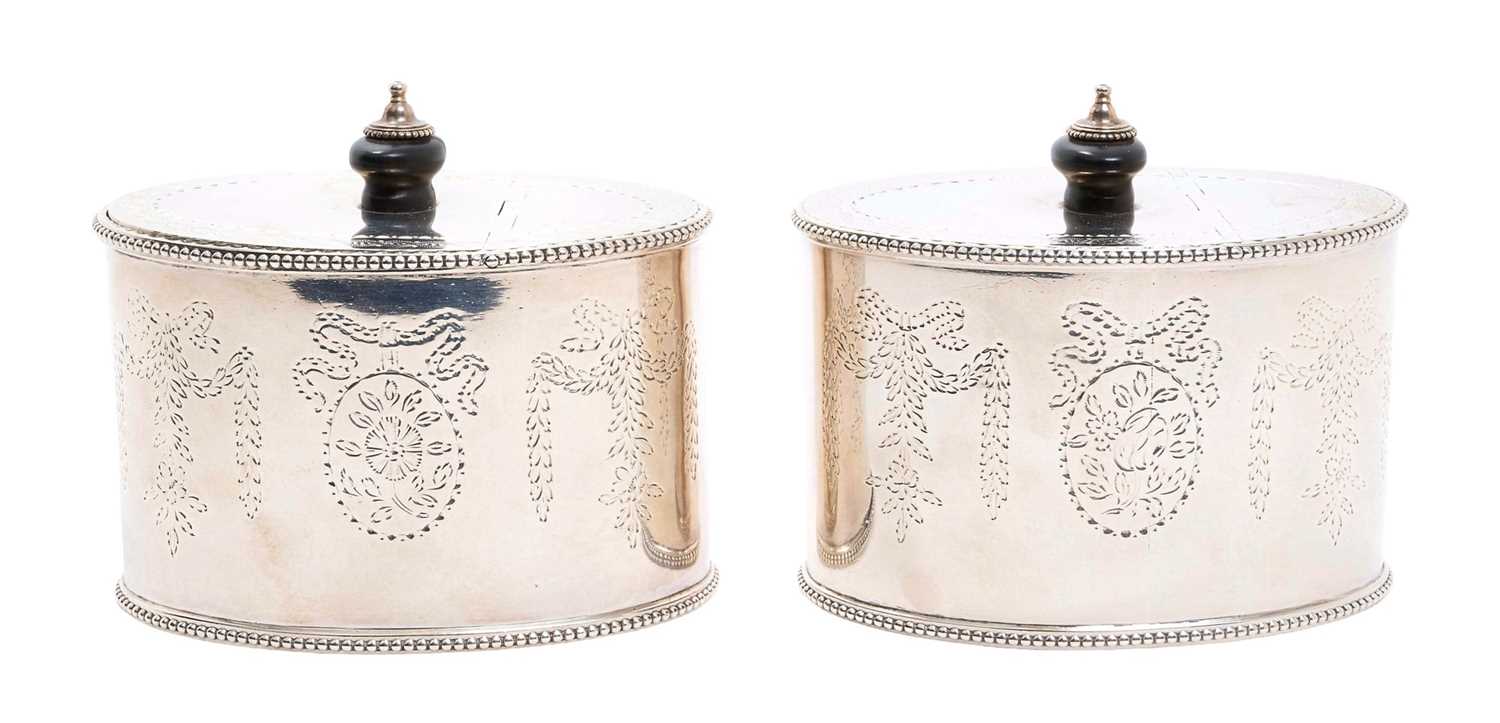 Lot 151 - A fine pair of George III Neo-Classical silver tea caddies by Robert Hennell, London 1779