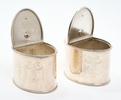 Lot 151 - A fine pair of George III Neo-Classical silver tea caddies by Robert Hennell, London 1779