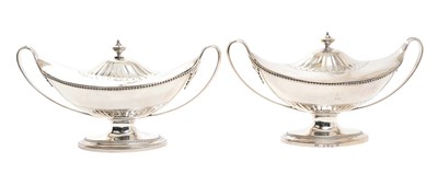 Lot 152 - A fine pair of George III Neo-Classical silver sauce tureens by John Schofield, London 1788.