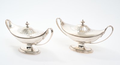 Lot 152 - A fine pair of George III Neo-Classical silver sauce tureens by John Schofield, London 1788.